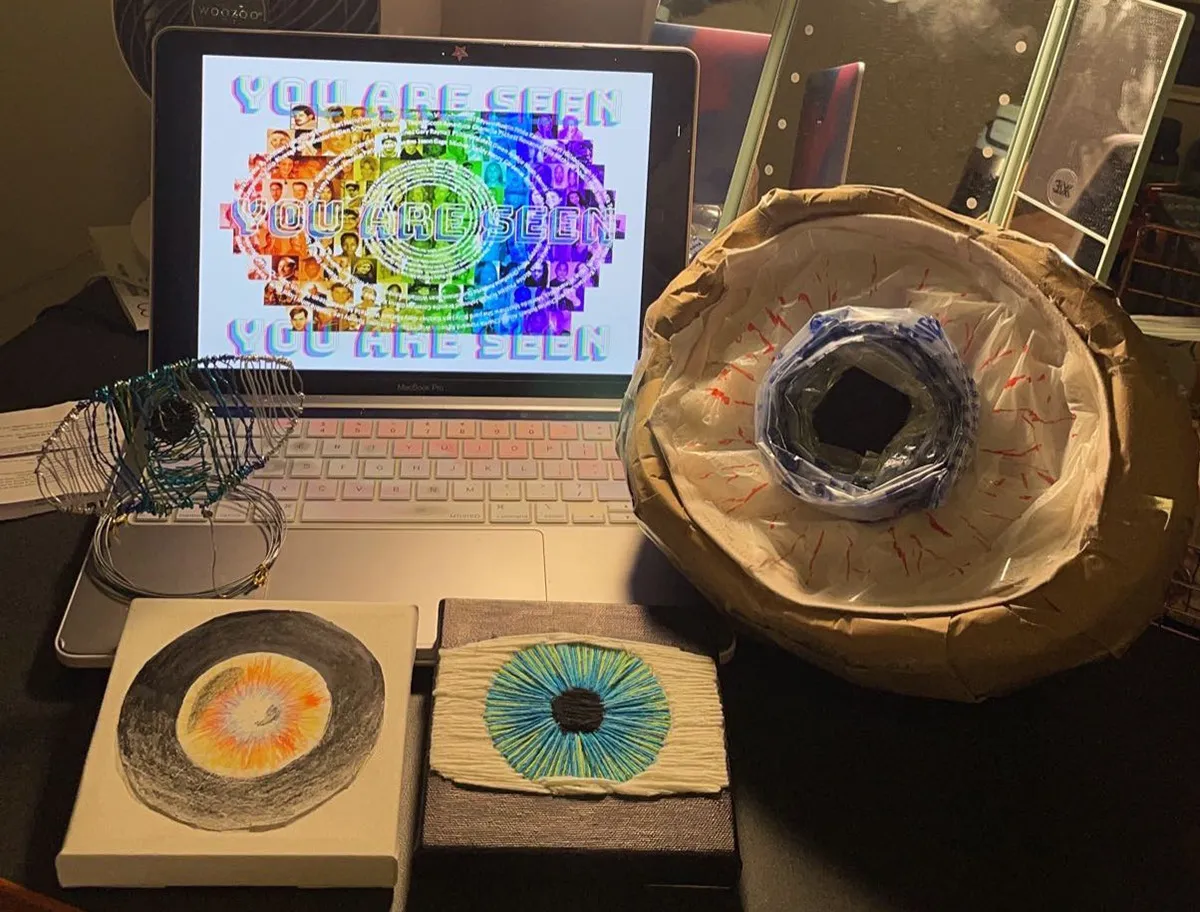 Mixed media collection of an eye rendered in five different mediums